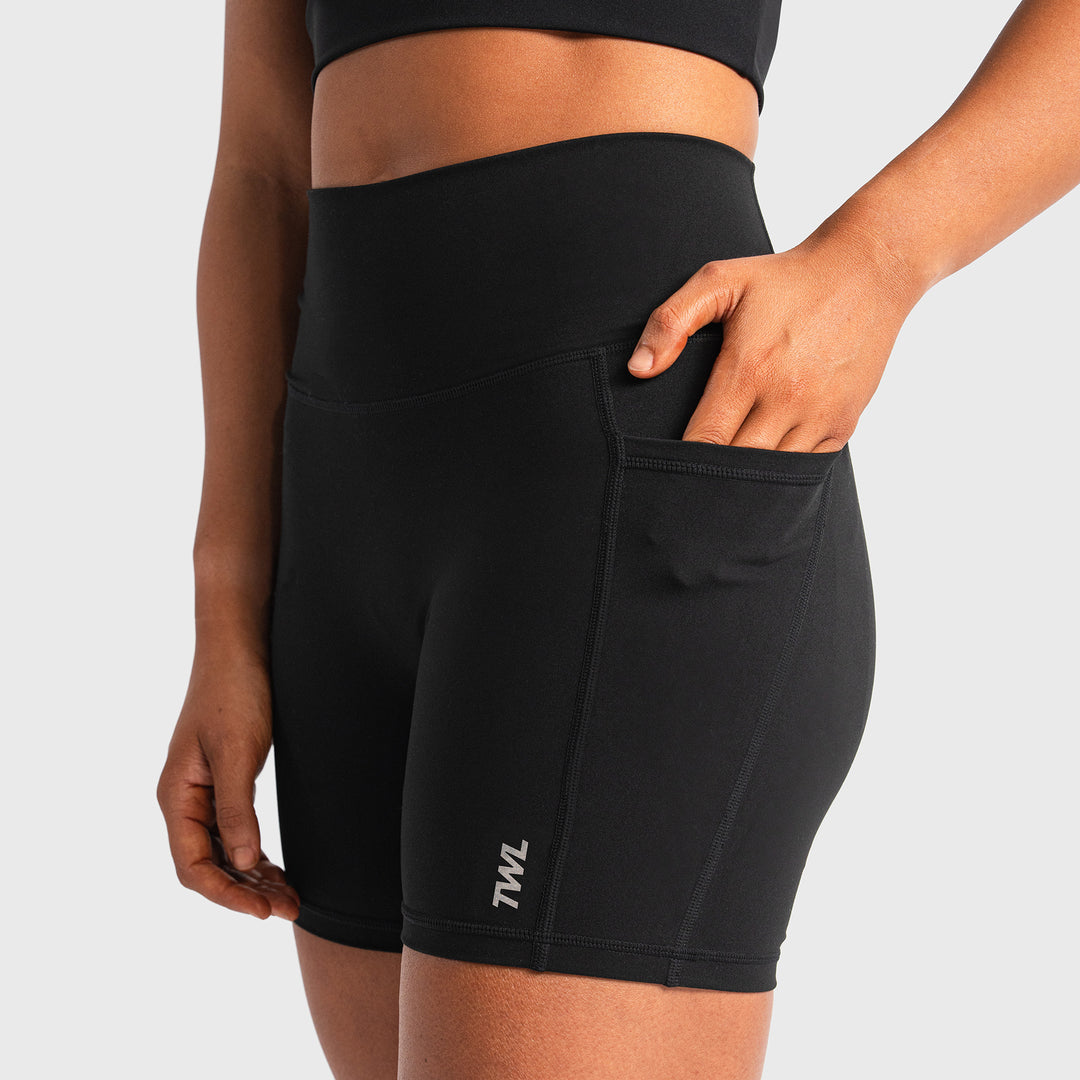 Refine Womens Gym Shorts Black with hand in side pocket
