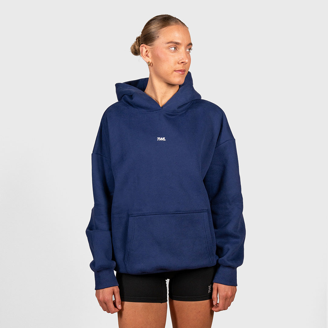 TWL Ascend Hoodie Navy – oversized fleece hoodie - front view on model