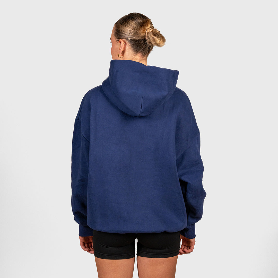 TWL Ascend Hoodie Navy – oversized fleece hoodie - back view on model