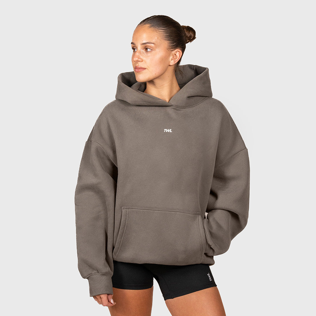 TWL Ascend Hoodie Charcoal – oversized fleece hoodie -  front view on female model