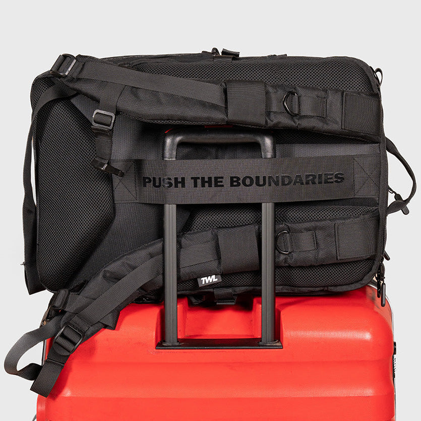 TWL Vanquish Backpack 2.0 50L Black – showing luggage strap