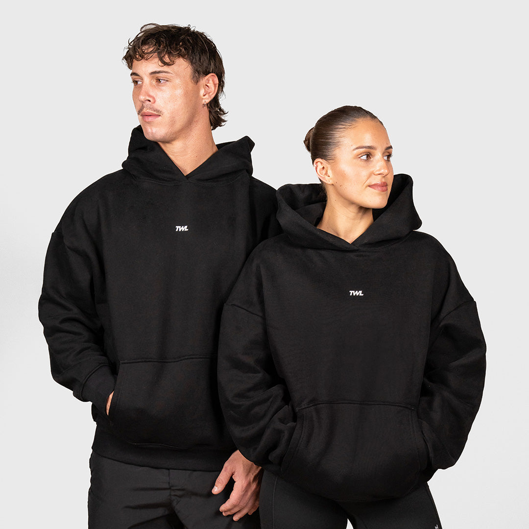 TWL Ascend Hoodie Black – oversized fleece hoodie - front view on models