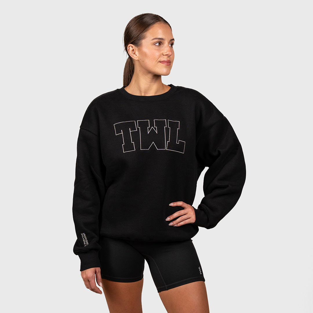 TWL Ascend Sweater Sweatshirt Crewneck Black - front view on female model