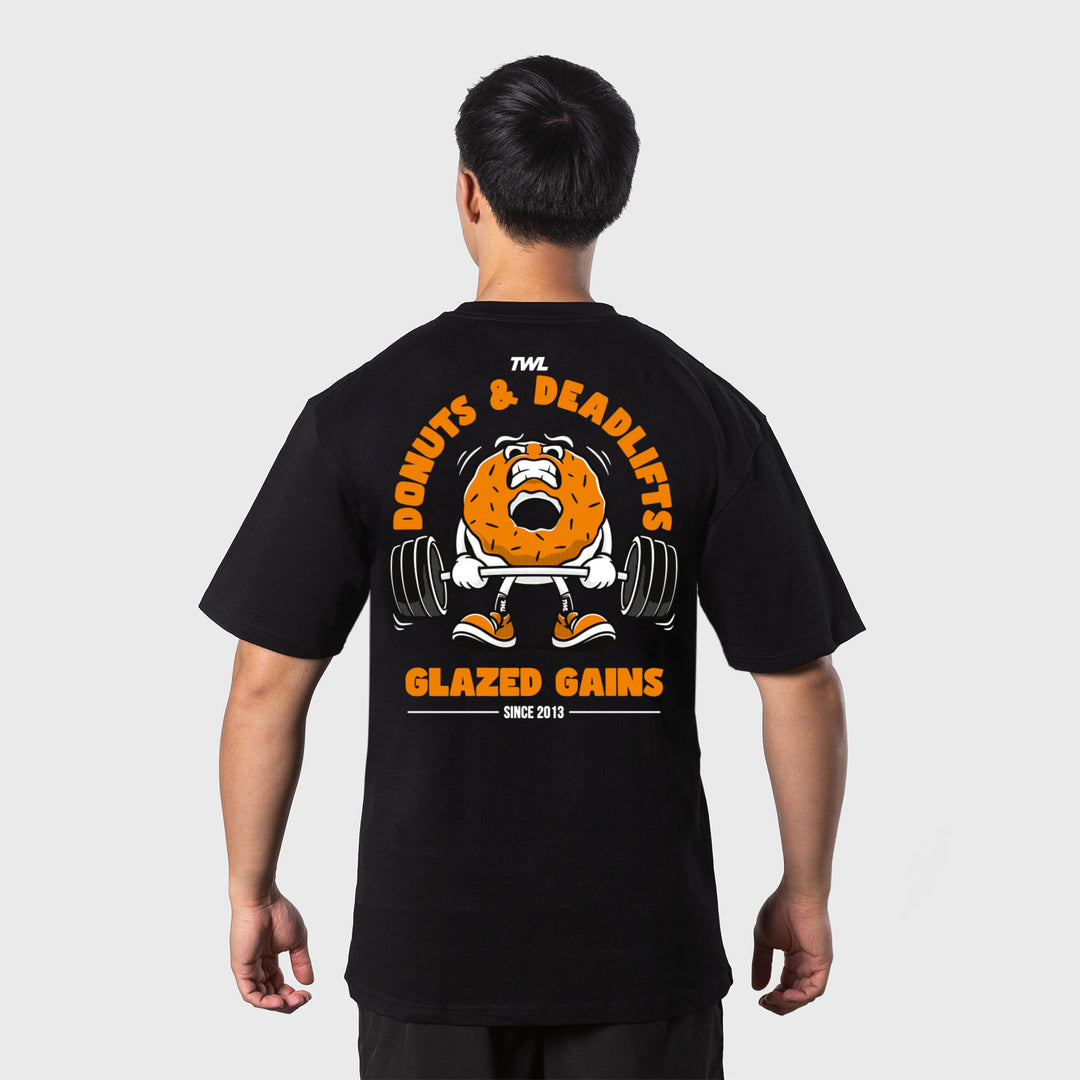 TWL - LIFESTYLE OVERSIZED T-SHIRT - DONUTS & DEADLIFTS - BLACK/ORANGE