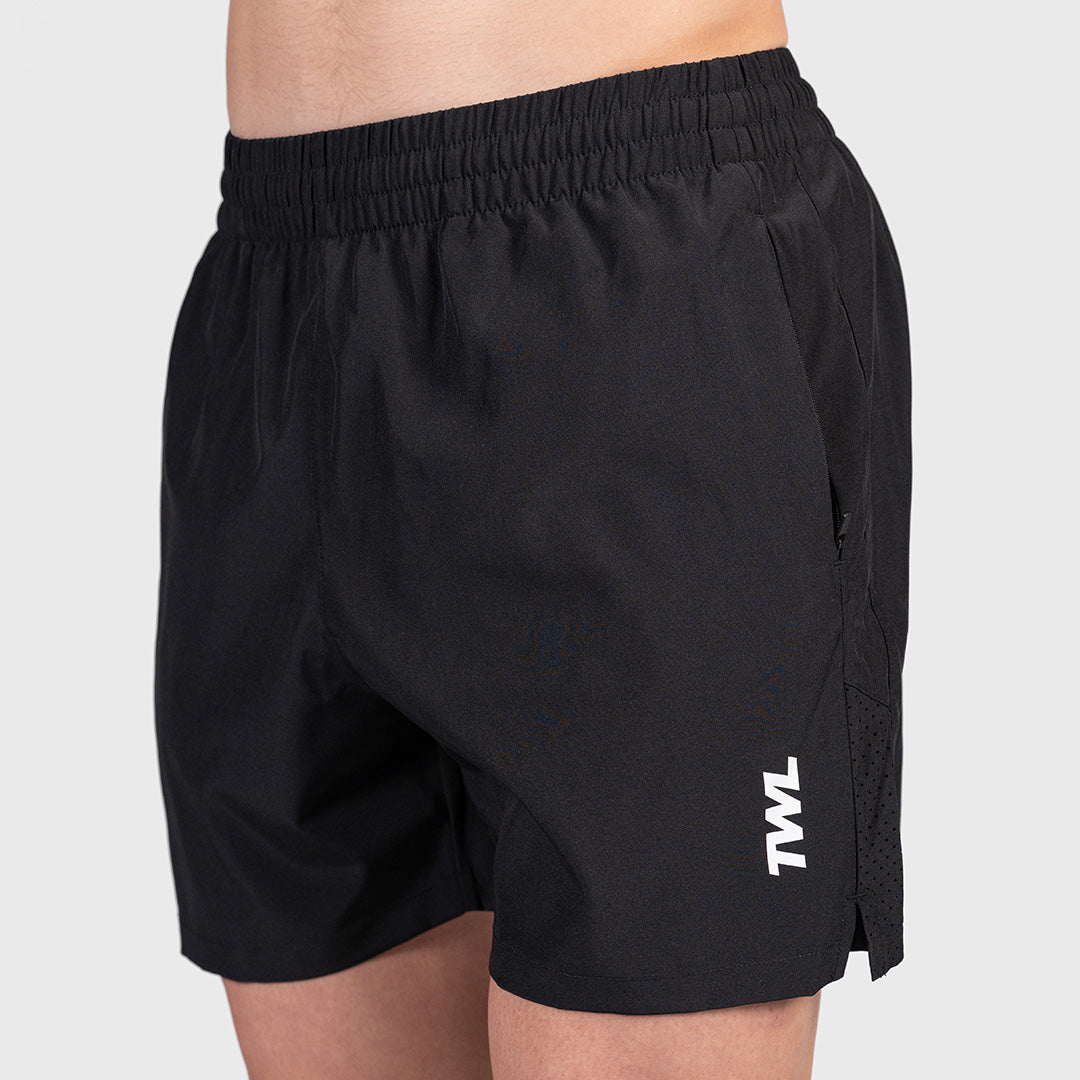 Close-up side-front view of the black TWL Men's Rep Shorts 5", showing the printed logo