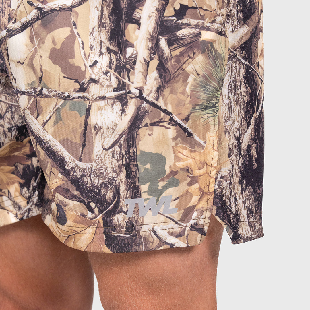 TWL Men's Vault Shorts 6 inch training shorts in tree camo, showing logo and side split for weightlifting detail