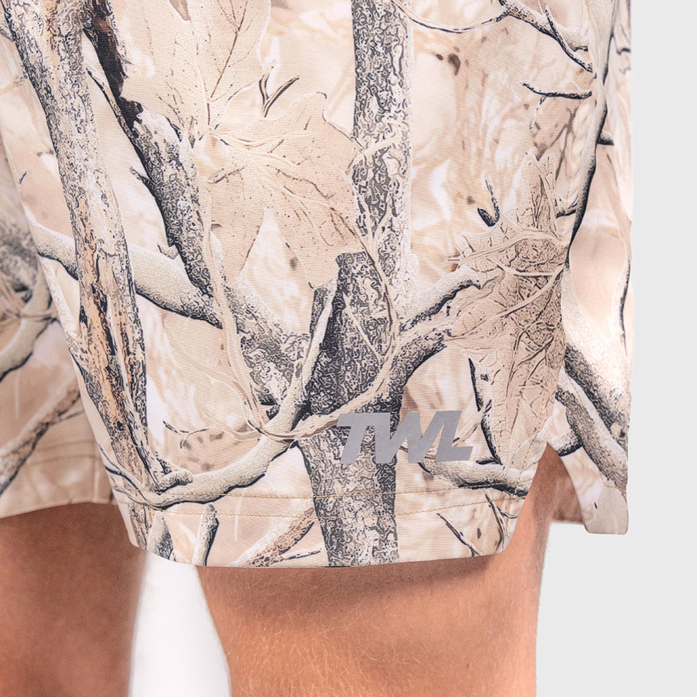 TWL Men's Vault Shorts 6 inch training shorts in tree camo, showing logo and side split for weightlifting and training
