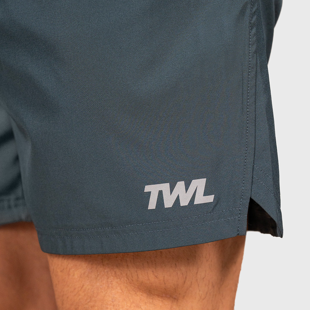 TWL Men's Vault Shorts 6 inch training shorts in charcoal teal, logo and side split
