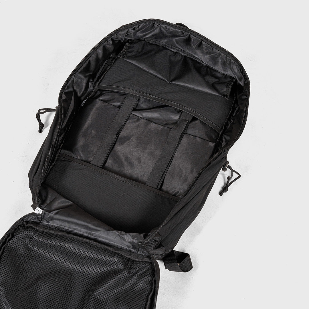 TWL Vanquish Backpack 2.0 50L Black – inside view showing full 180 degree opening and pocket for ruck plates